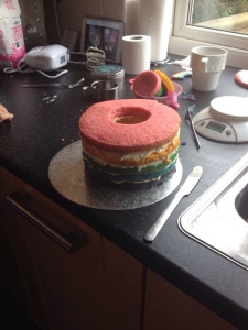 The bottom 5 layers, with buttercream in between each layer. I then added the sweets and placed the top layer on top (no hole in the top layer)