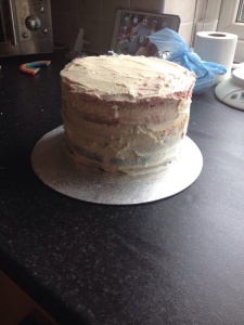 Once the top layer was added I covered the full cake in a thin layer of buttercream then put into the fridge for an hour or so.